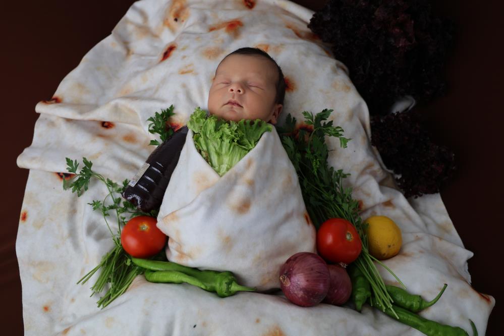 Bankacılığı bırakıp fotoğrafçı oldu, kendisini yeni doğan bebeklere adadı