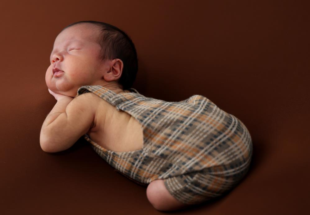 Bankacılığı bırakıp fotoğrafçı oldu, kendisini yeni doğan bebeklere adadı