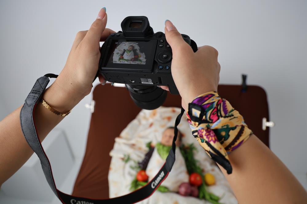 Bankacılığı bırakıp fotoğrafçı oldu, kendisini yeni doğan bebeklere adadı