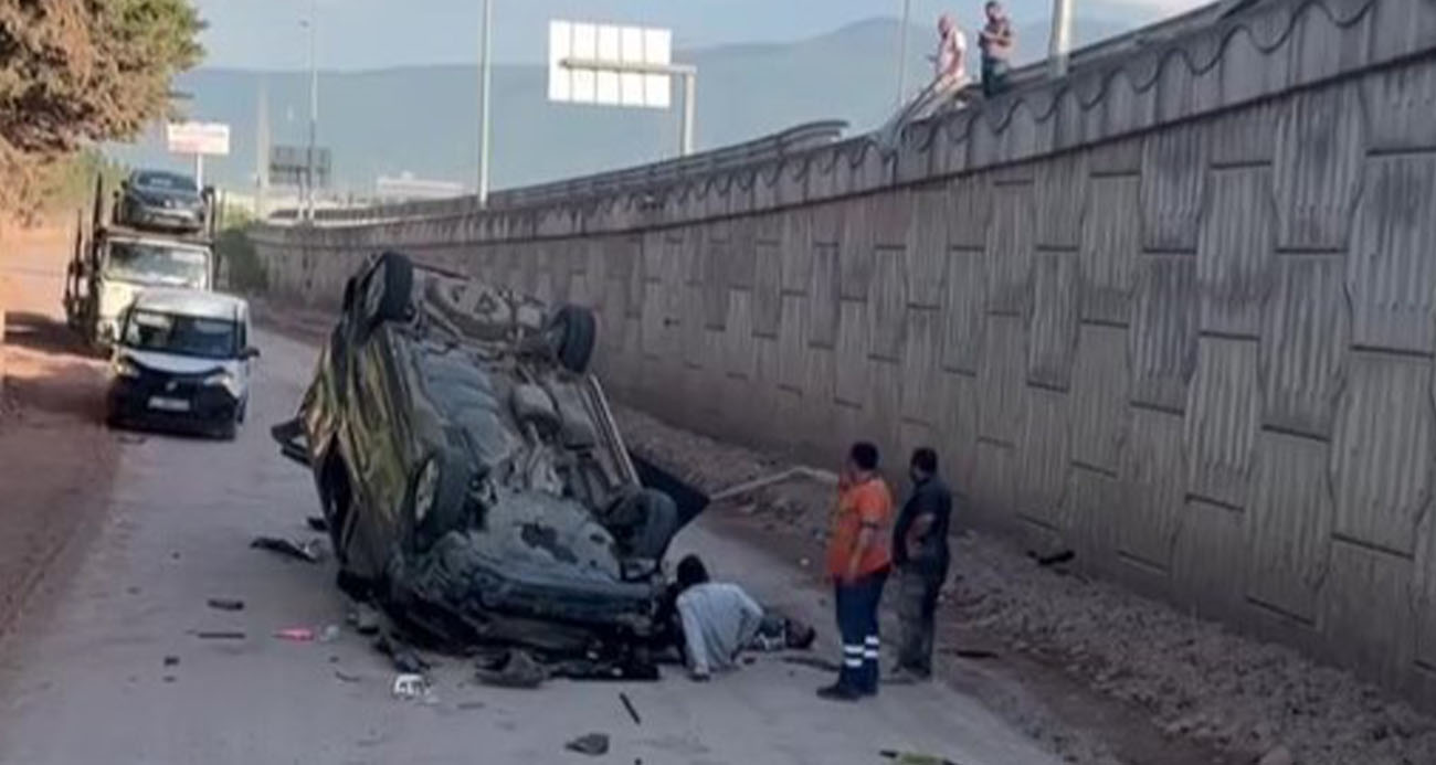 Hafif ticari araç 5 metre yükseklikten uçarak ters döndü: 2 yaralı