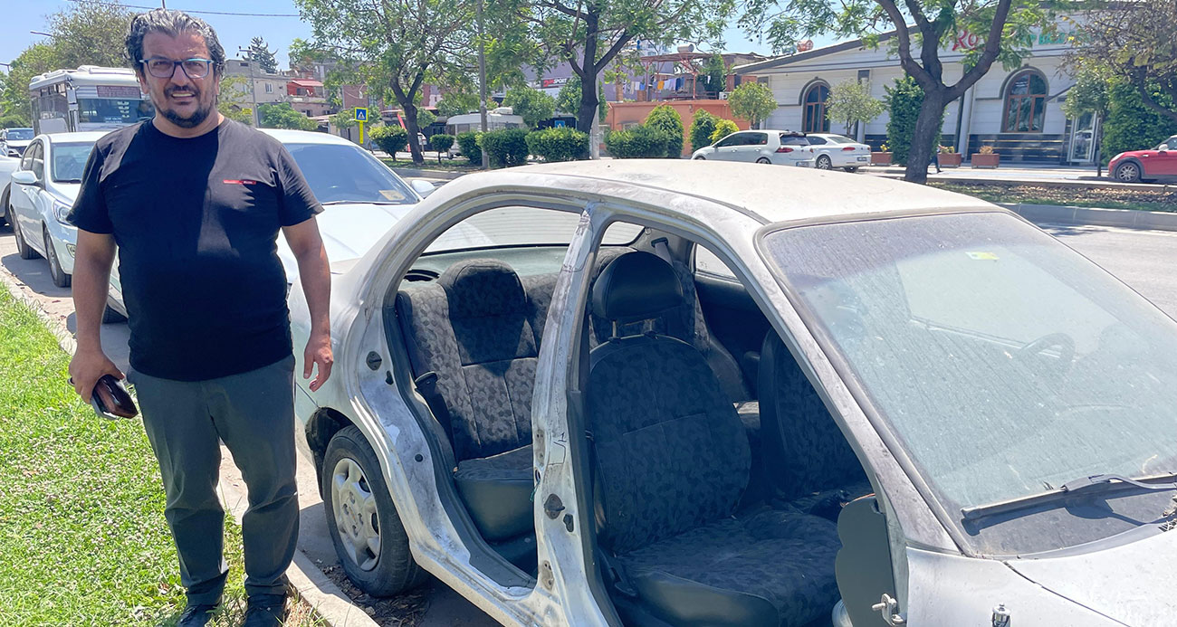 Adana’da gazetecinin otomobilinin kapıları çalındı: O anlar kamerada