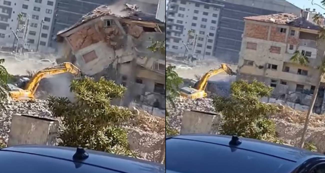 Yıktığı binanın altında kalmaktan saniyelerle kurtuldu, korku dolu anlar kamerada