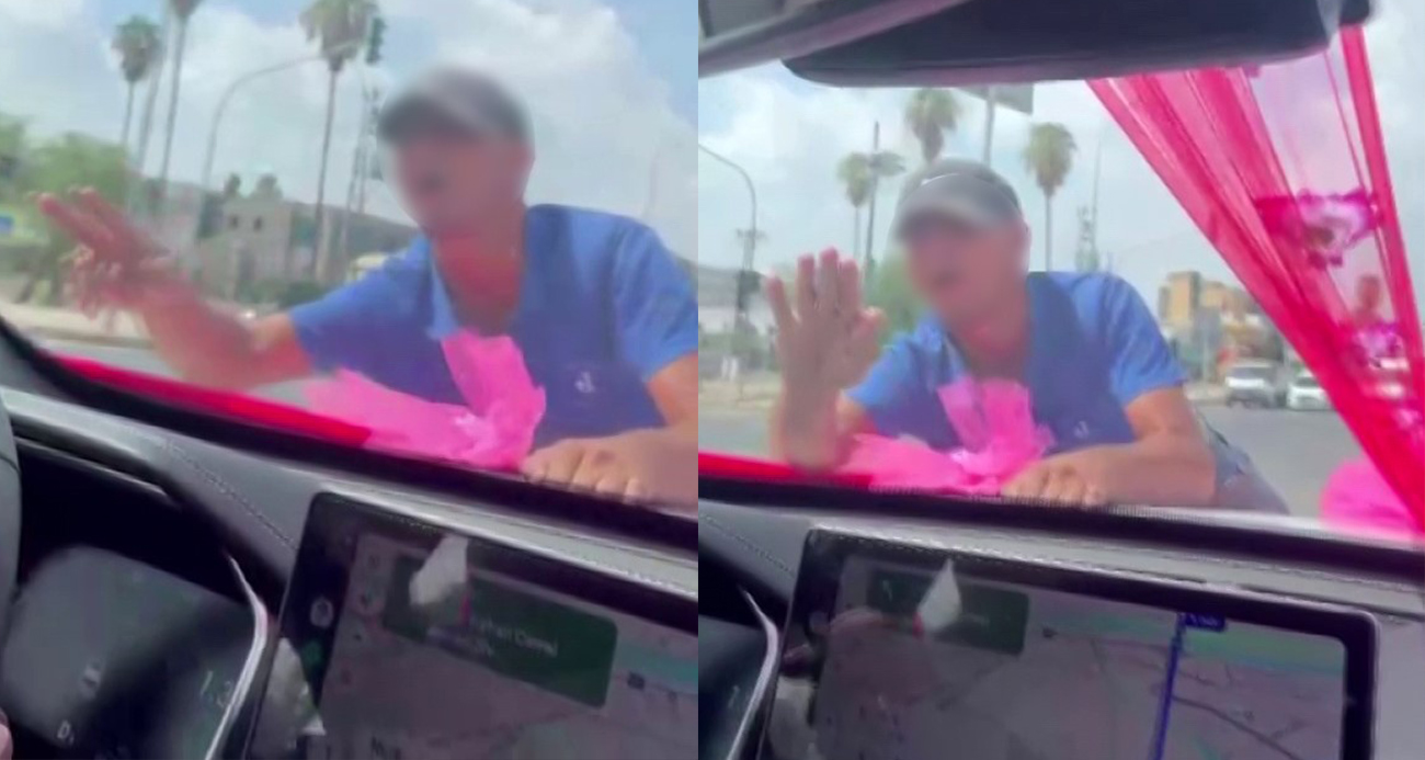 Gelin arabasının önüne atlayan genç, gelin ve damadı korkuttu