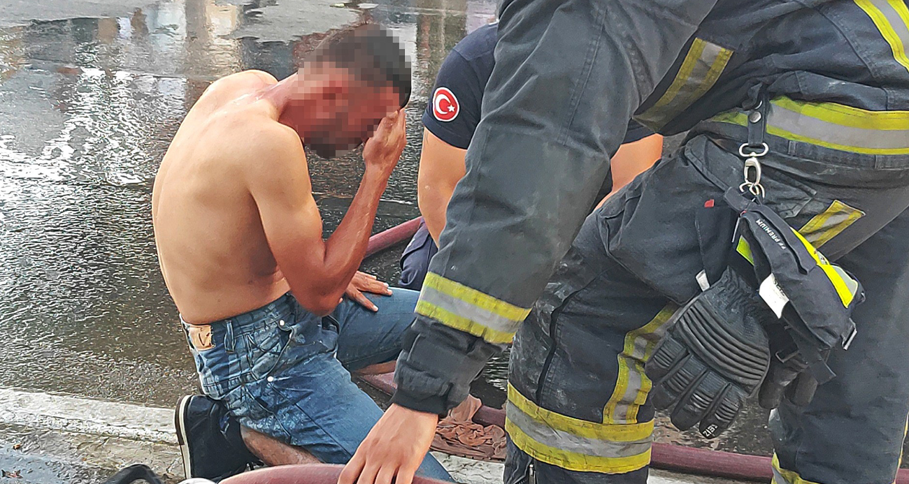 Üzerine döktüğü benzin gözlerinden ediyordu