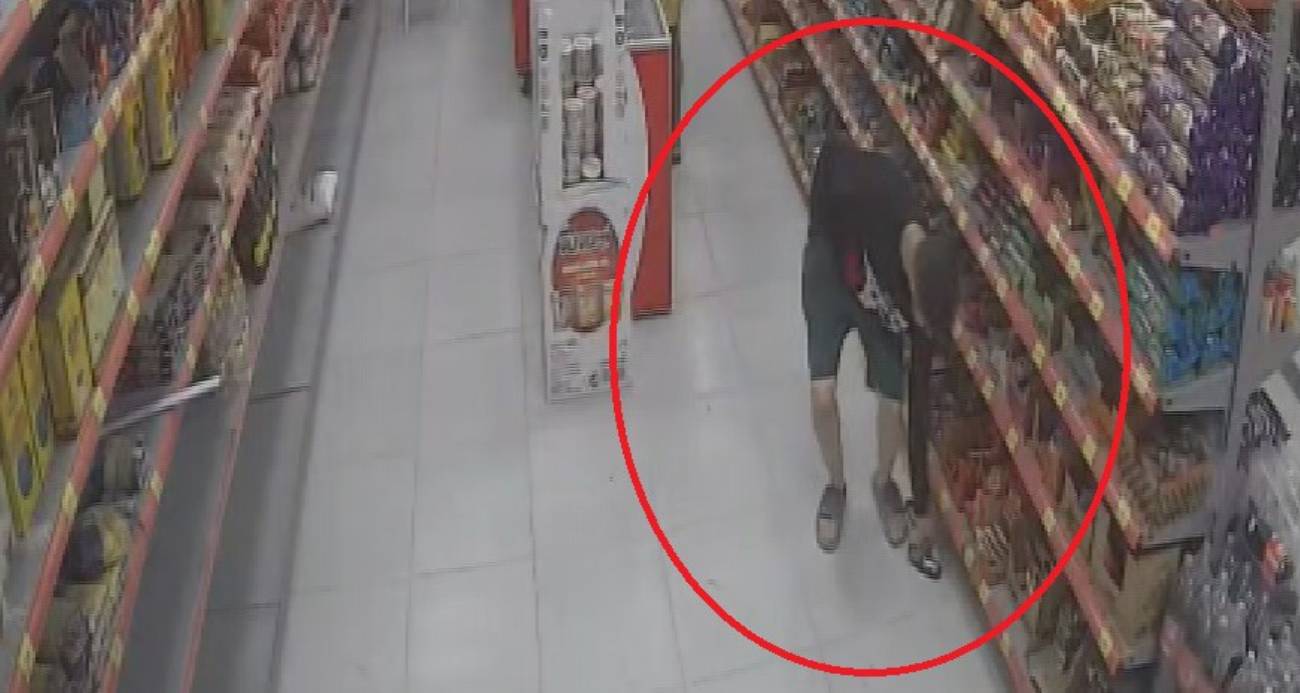 Yaptığıyla şaşırtan hırsız, 100 TL’lik enerji içeceği ve bisküvi çaldı: O anlar kamerada