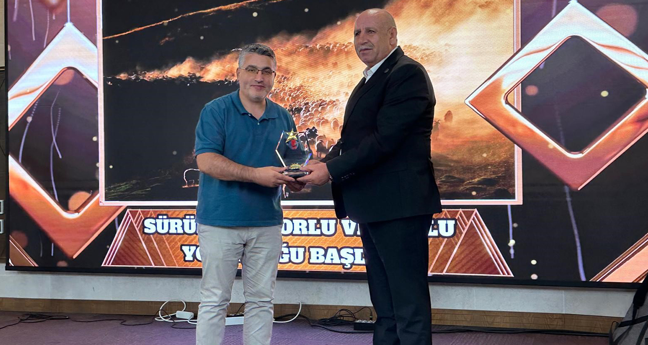 İHA muhabiri Özkan Olcay, birincilik ödülünü aldı