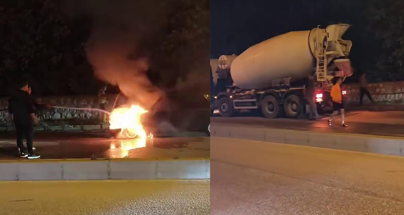 Alevlere teslim olan otomobile mikser sürücüsünden müdahale