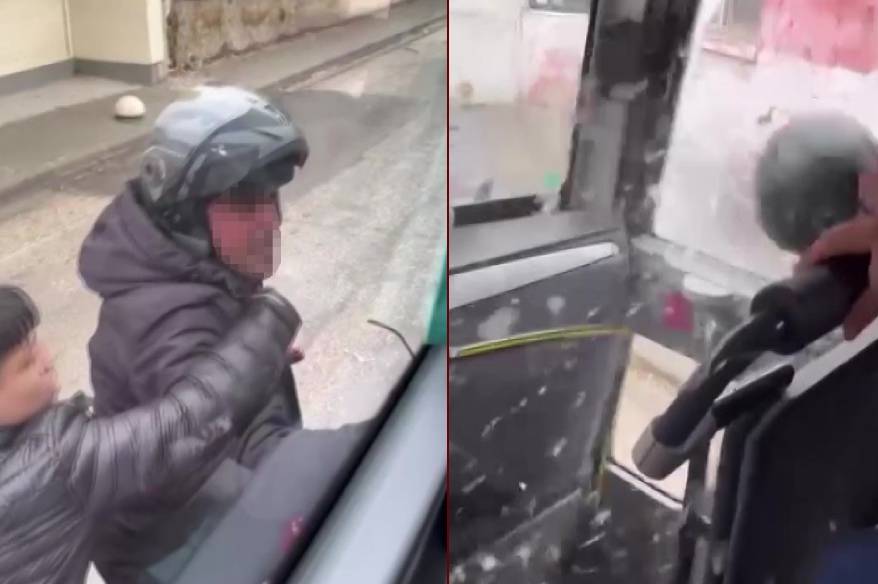 Trafikte tartıştığı servis aracının camını kaskıyla kırdı