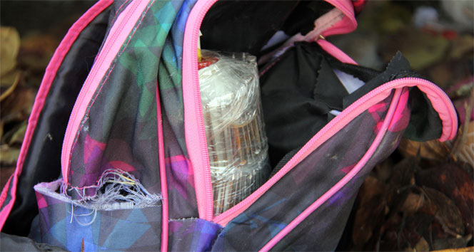 Teröristler tabut ve okul çantasına mühimmat gizledi