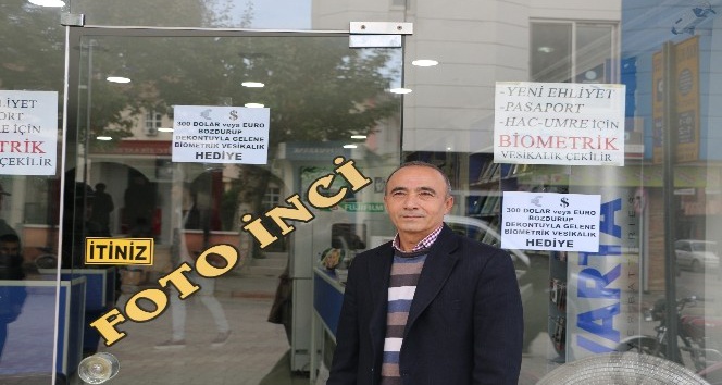 300 dolar bozdurana, biometrik vesikalık hediye