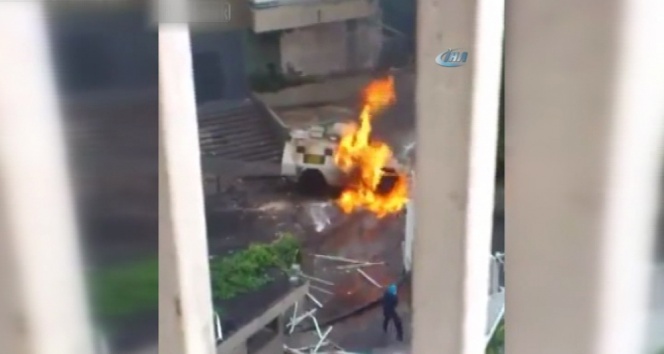 Protestocular polis panzerini yaktı, alevler binaya sıçradı