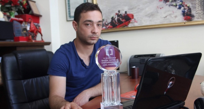 Siirtli muhabir ödülünü 15 Temmuz şehitlerine armağan etti