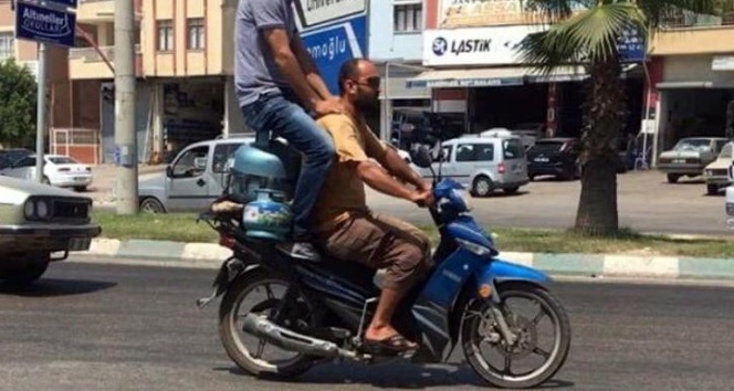 Adana&#039;da motosiklette tüp üstü yolculuk