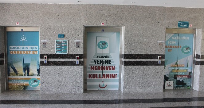 Hastane asansörleri “Sağlığın İçin Hareket Et” yazı ve resimleriyle giydirildi