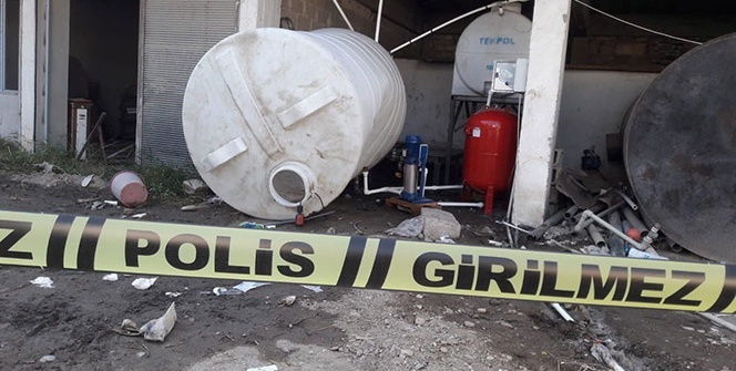 Tankın içinde baygın bulunan genç hastaneye kaldırıldı