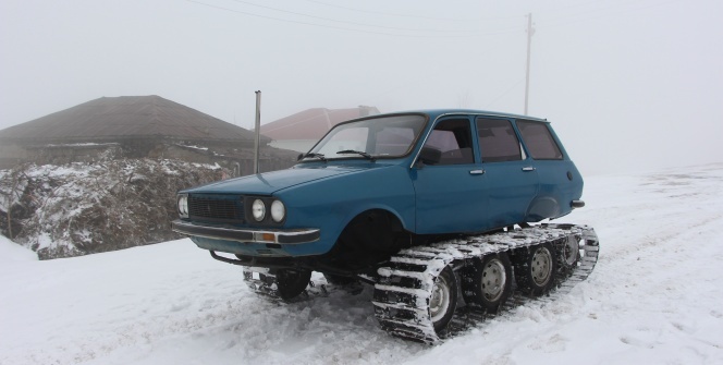 Hafta sonları en büyük eğlencesi paletli Toros'u ile karla kaplı yaylayı gezmek