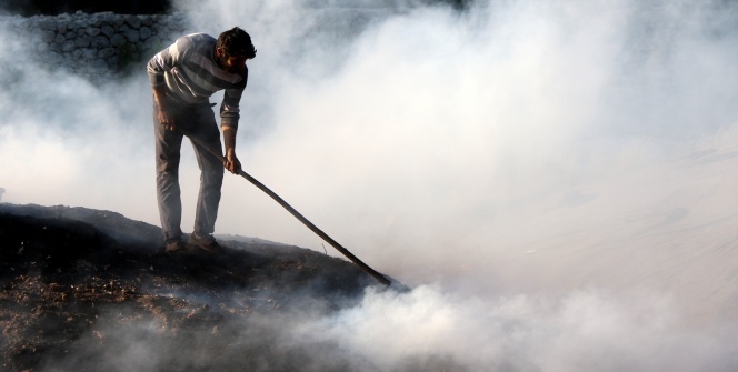 Yüzlerinde kömür karasıyla mevsimlik işçiler