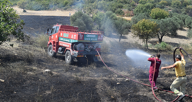 Aliağa&#039;daki yangının, ormanlık alana sıçramaması için büyük mücadele