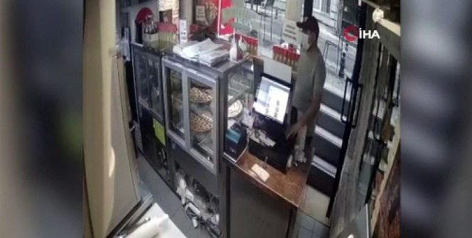Pizza siparişi verip cep telefonu çalan hırsız kamerada İhlas Haber