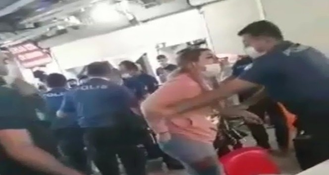 Maske cezası yazmak isteyen polise yumruk atan evli çift gözaltına alındı