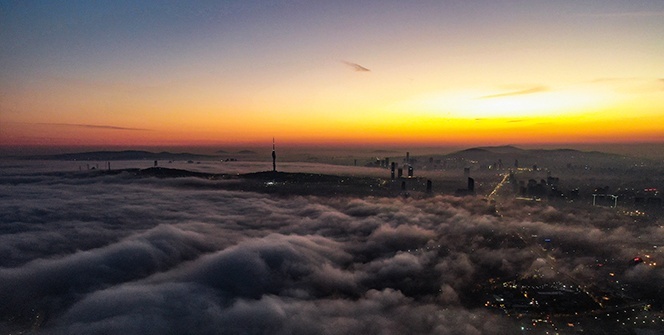 Sise bürünen İstanbul’da gündoğumu