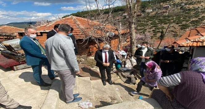 Evi yanan aileye yardım eli