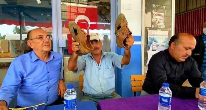 İYİ Partinin yırtık ayakkabılı çiftçi paylaşımı tartışmaya yol açtı