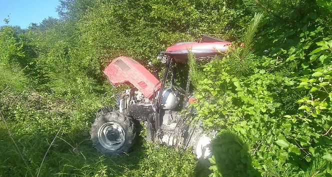 Ot biçerken traktörle uçuruma yuvarlandı