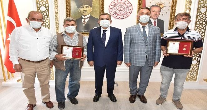 Karaman’da hayırseverlere madalya ve berat belgeleri verildi