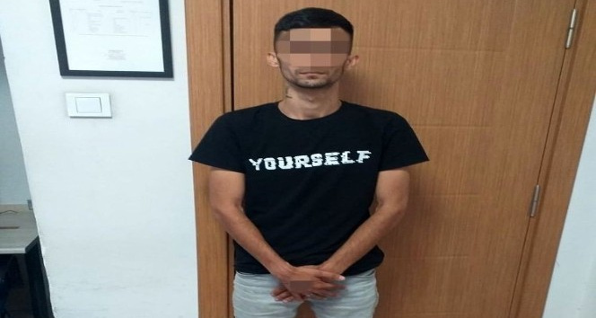 Evden laptop ve para çalan zanlı yakalandı