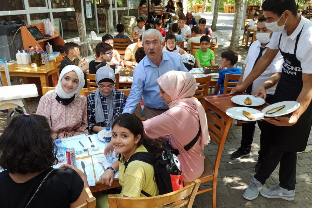 Balıkçı Kenan’dan Kuran kursu öğrencilerine balık ikramı