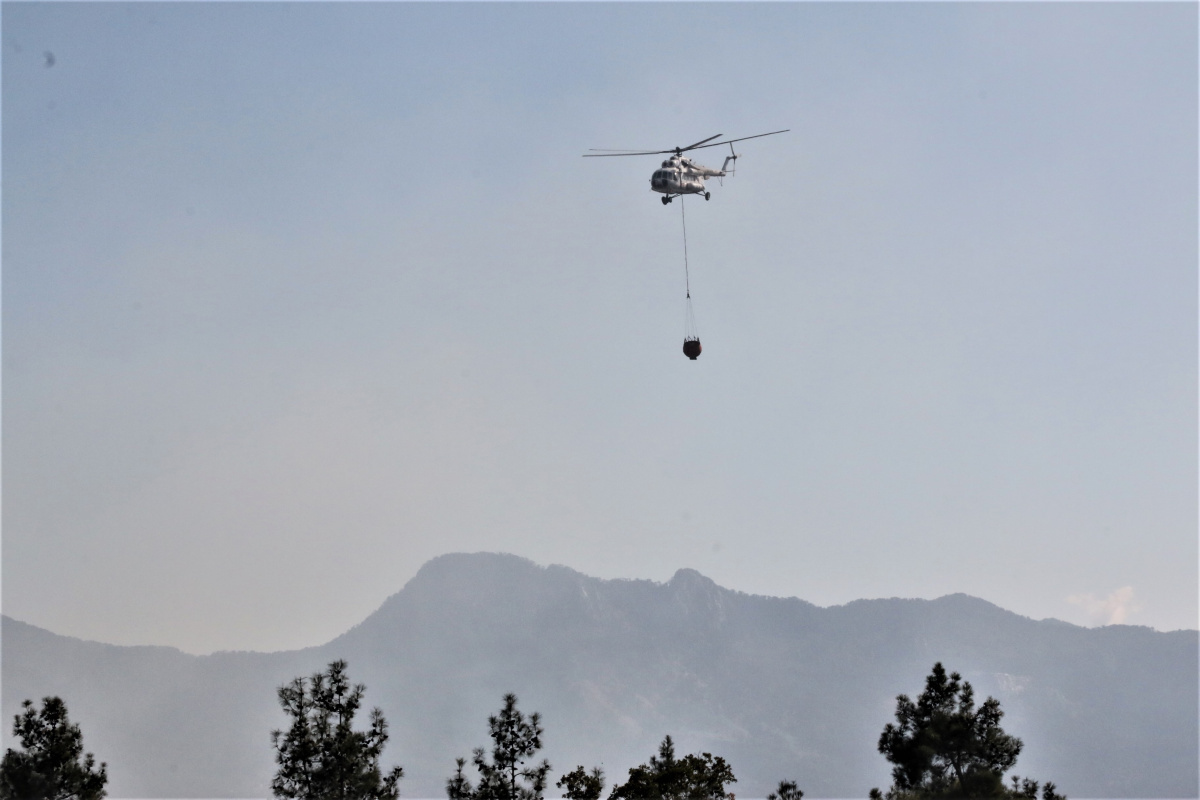 Antalya’da dağlık alanda çıkan orman yangını kontrol altına alındı