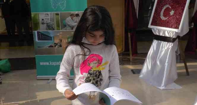 Diş sağlığına dikkat çekmek için çocuklara boyama kitabı dağıtıldı