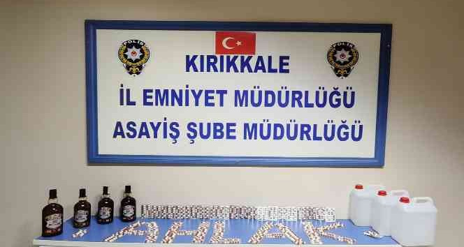 Trende rahatsızlanınca yakayı ele verdi: Yüzlerce hap ile kaçak alkol ele geçirildi