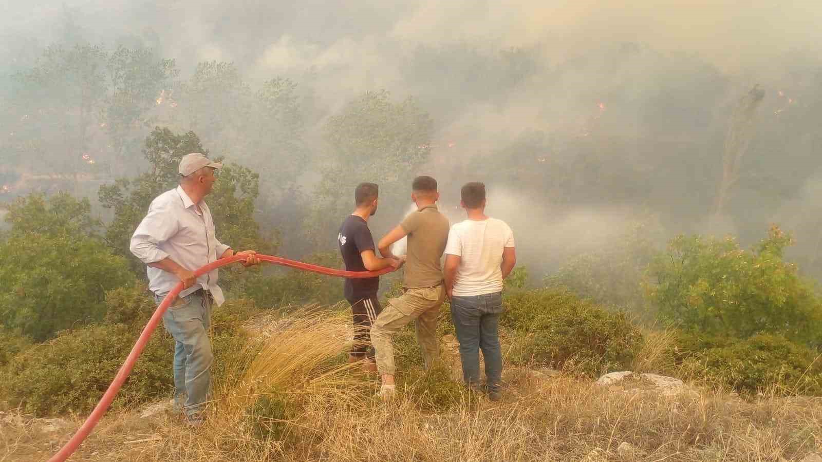 Yenişehir’de kontrol altına alınan yangın rüzgarın etkisiyle tekrar başladı