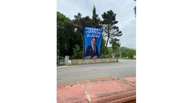 CHP milletvekili adayının seçim afişi mezarlığa asıldı