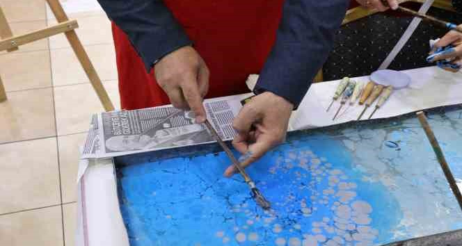 Kaymakam Rüstemoğlu ve Başkan Şimşek’ten ebru gösterisi