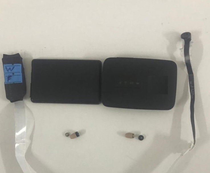 Ehliyet sınavında &ouml;zel d&uuml;zenekle kopya &ccedil;ektiren 5 ş&uuml;pheli tutuklandı
