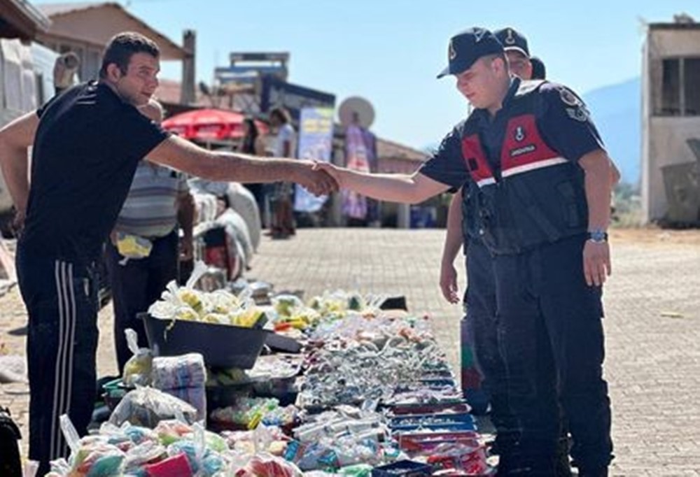 Karacasu jandarması vatandaşları sahte para ve dolandırıcılığa karşı bilgilendirdi
