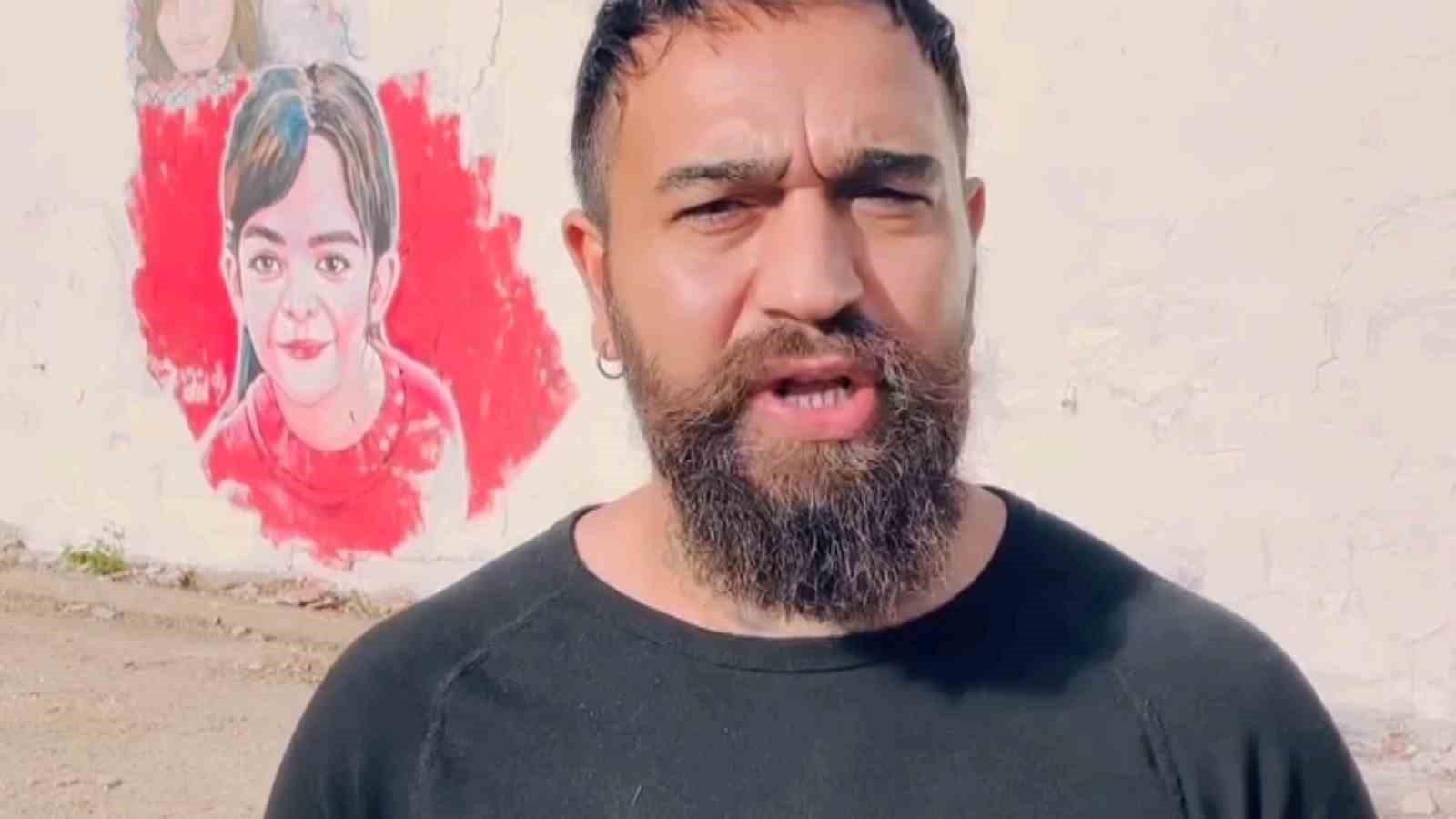 Azerbaycanlı sanat&ccedil;ı duvara &ldquo;Başka cinayet olmasın" yazdı
