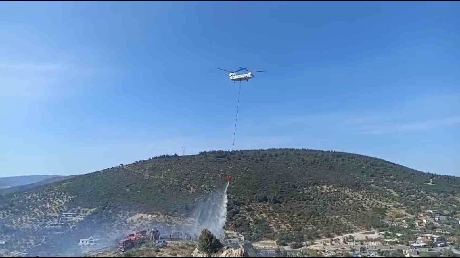 Foça’da bir depoda başlayan ve ormanlık alana sıçrayan yangın söndürüldü