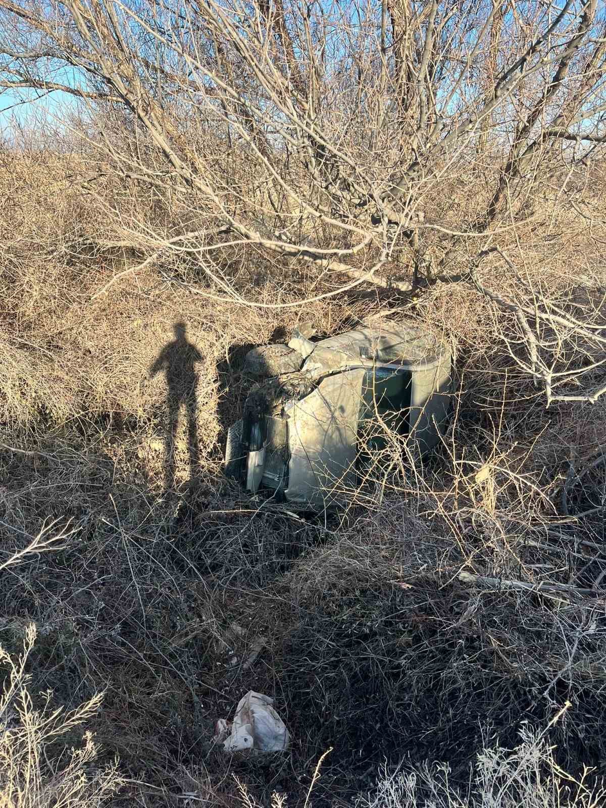 Takla atan otomobilden yara almadan kurtuldu
