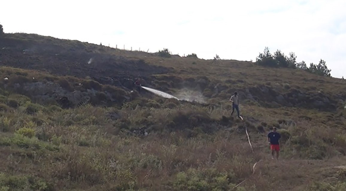 Sinop&rsquo;ta &ccedil;alılık alanda &ccedil;ıkan yangında kalan bir kadın, itfaiye ekiplerince kurtarıldı
