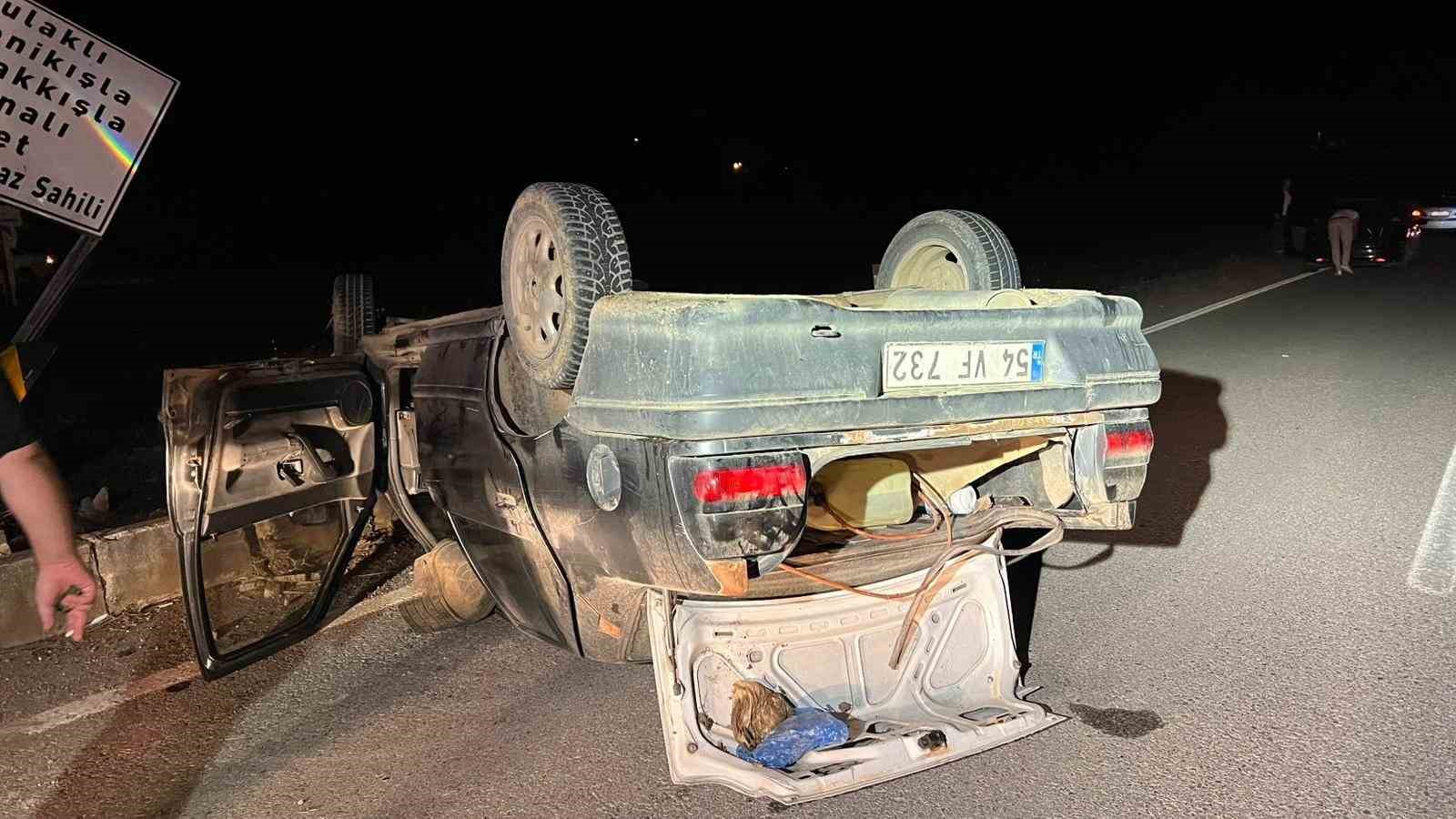 Takla atan otomobilde sıkışan sürücüyü itfaiye ekipleri kurtardı