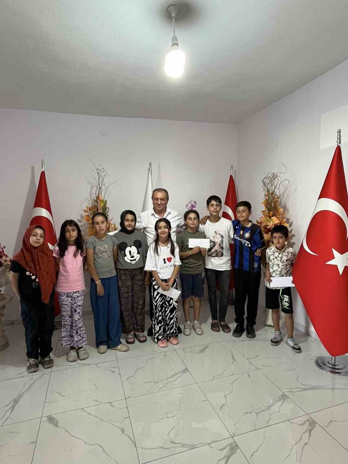 G&ouml;m&uuml; kasabasında Kur&rsquo;an-ı Kerim&rsquo;e ge&ccedil;en başarılı &ouml;ğrencilere &ouml;d&uuml;l verildi
