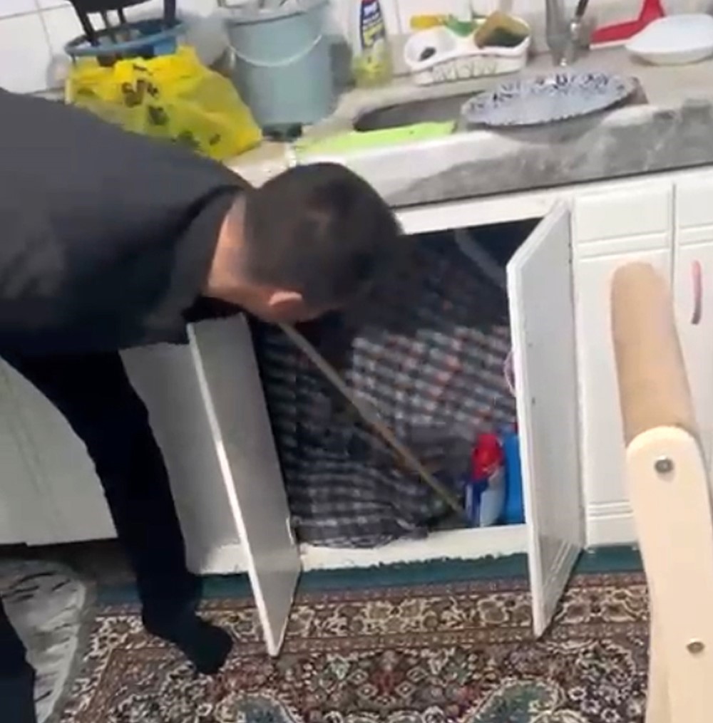 Firari şahıs mutfak dolabından çıktı
