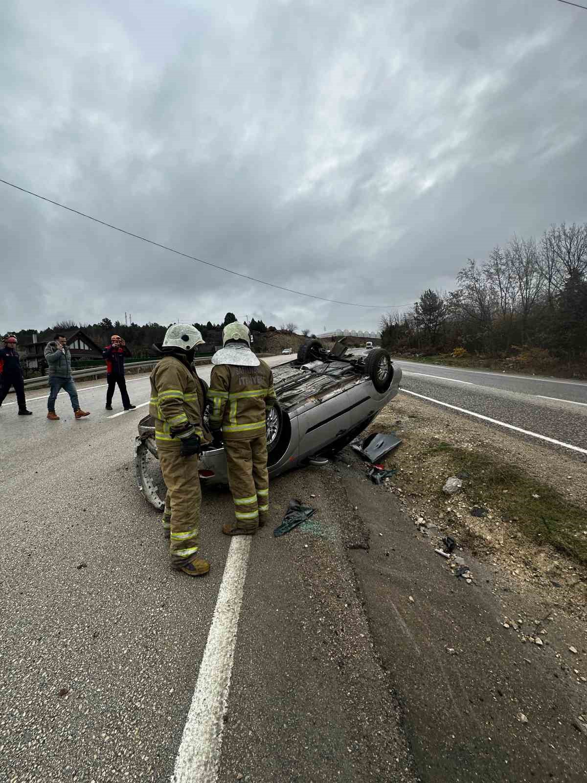 Takla atan otomobilden yara almadan kurtuldu