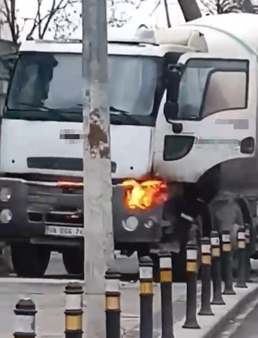 Beton kamyonu alev aldı, esnaf güçlükle söndürebildi