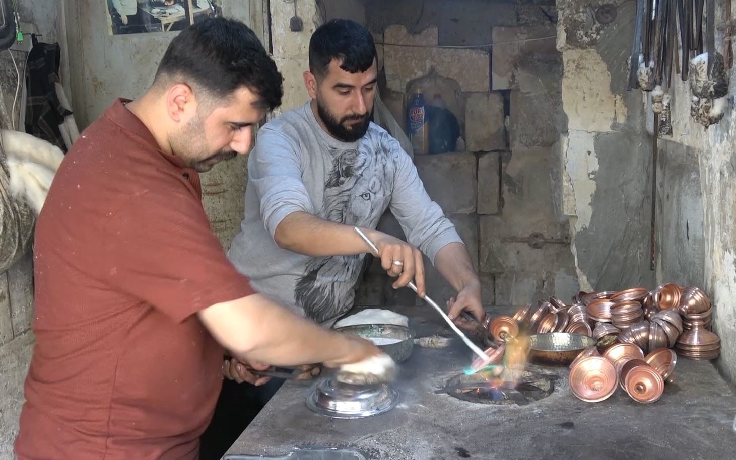 İkiz kardeşler baba mesleğini yaşatıyor
